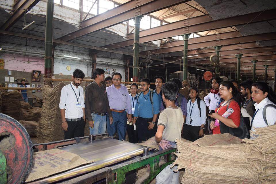 An industry visit to Empire Jute Mill, Titagarh, was conducted by the Department of Management Studies on 28th March 2019. The students were exposed to the different business simulation processes like production operation, labour issues, manpower planning, demand management etc. This visit  gave the students a first hand insight to the detailed function and understanding of the jute industry. The students of BBA and MBA along with their faculty members  Prof. Banerjee, Dr. Poddar and Dr. Das had a unique learning experience.
